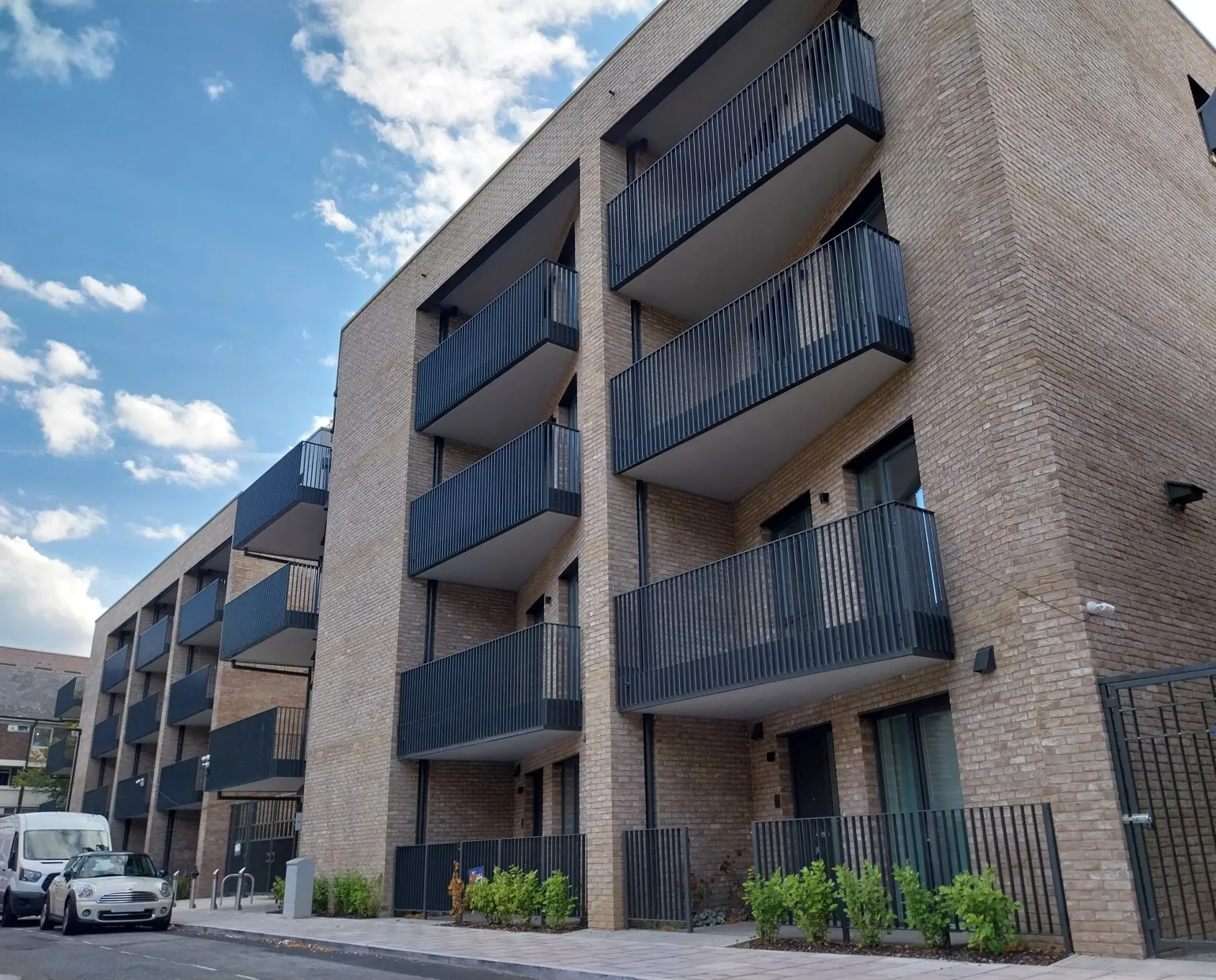Fire-rated aluminium railing for new affordable homes

Fenwick Place in Clapham comprises 27 new affordable homes across two residential blocks, forming part of a wider regeneration programme in the London Borough of Lambeth.

BM Architectural supplied its EazyRail aluminium railing system to the project, providing each dwelling with a robust, fire-safe and stylish safety barrier at the perimeter of its outdoor space.
