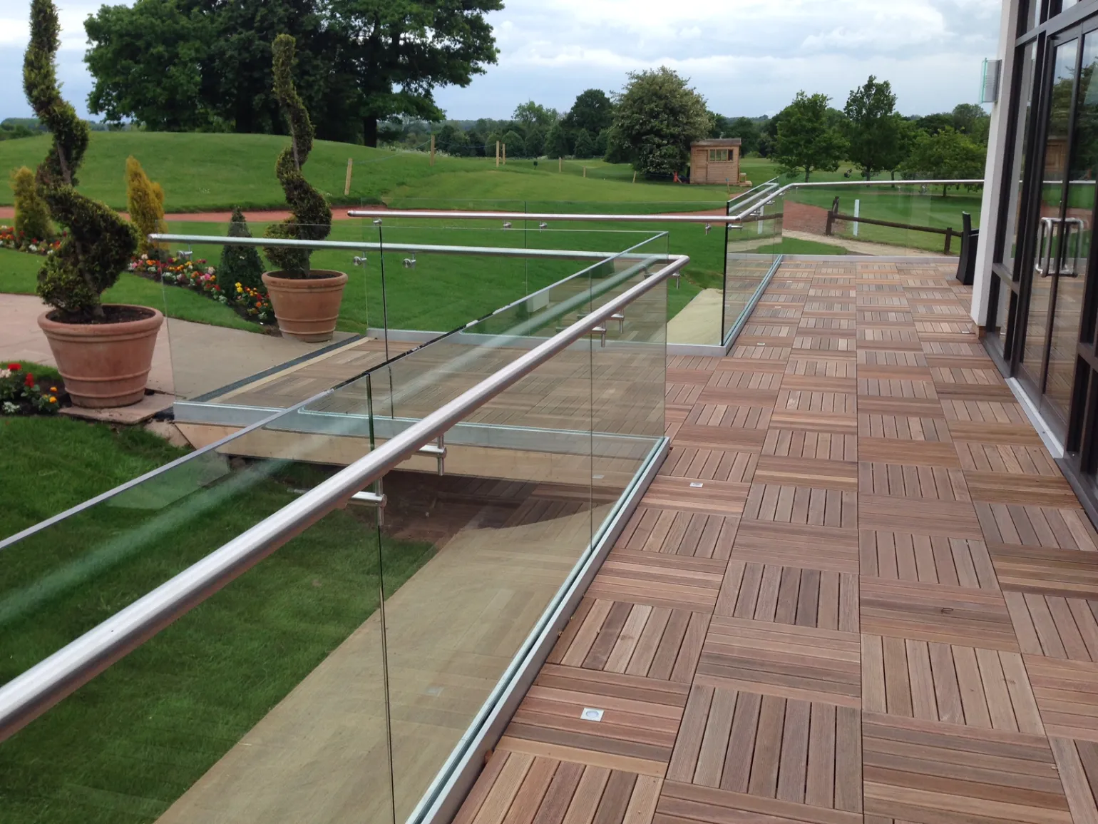Handrails 

Our handrail options are all easy to install and provide a stylish finishing touch to any glass balustrade. 

Suitable for use with all frameless systems – continuous channels, stand-offs or spigots – our slotted stainless steel handrails are available as circular, square or rectangular sections. They are supplied in six metre lengths in either grade 304 or 316 with a satin finish (320 grit) and can be mirror polished on request.

As an alternative to slotted handrails that fit over the top of a glass balustrade, we also supply handrails that bolt through the glass; a popular choice when a balustrade is over 1100mm high and a handrail is required at a more comfortable height for users. These stainless steel systems comprise either fixed or articulated offset brackets, that are designed to suit a range of glass thickness (8-25mm, 12-30mm), and ornamental tube, typically either 42mm or 48mm in diameter and supplied in six metre lengths. All components are available in grade 304 or 316 stainless steel, satin finish 320 grid and can be mirror polished on request.

Stiffeners

Stiffeners are typically used in external applications which are subject to high winds or other forces that may affect the position of individual glass panels. They help maintain glass alignment by providing extra stability to the balustrade while retaining the overall frameless aesthetic.
