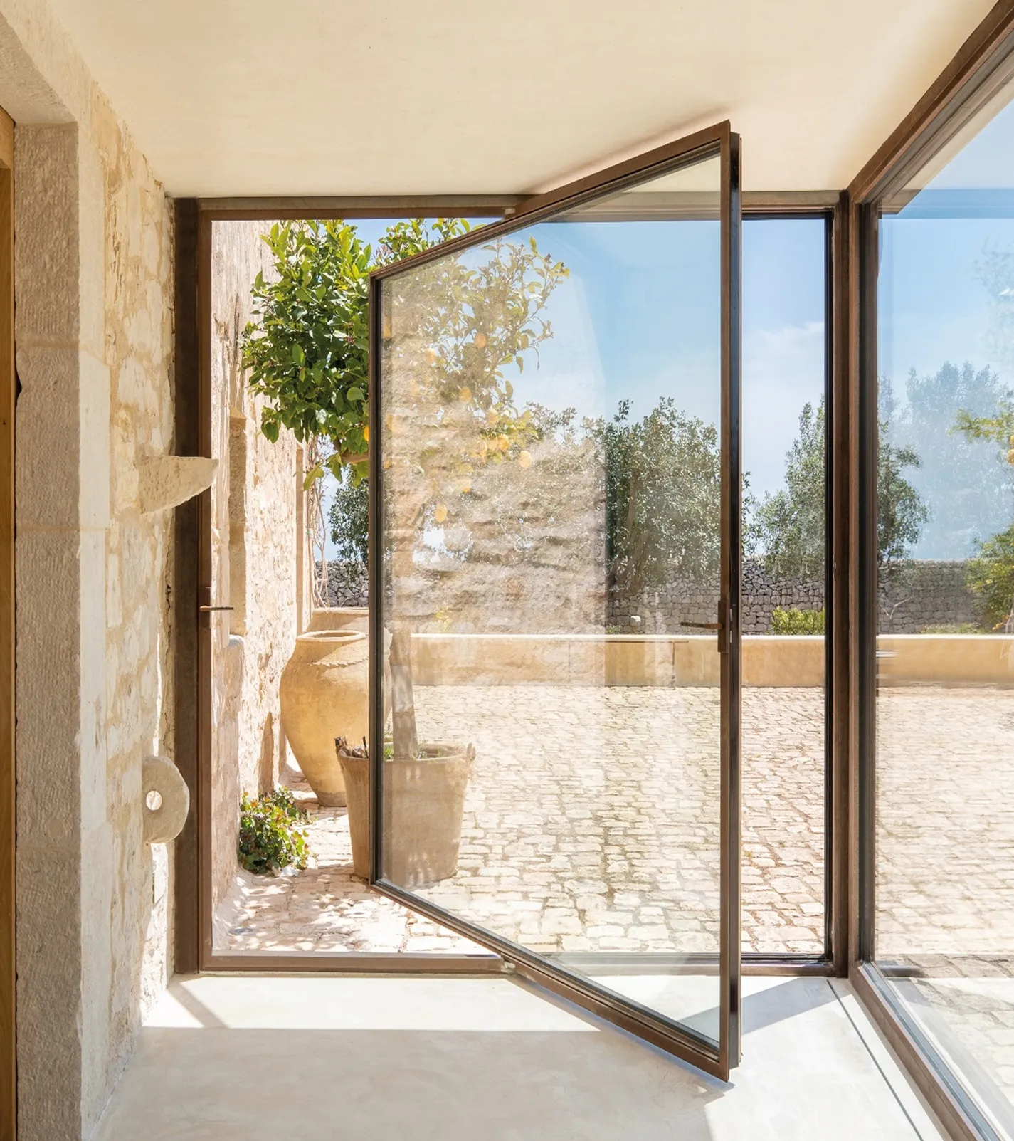 Burglar-Proof 

The 0S2 system provides high protection from burglary and vandalism without sacrificing a slender profile and architectural styling.  

The system, for example, maintains its 47mm lateral sections and 62mm central sections in its RC-rated burglar-proof windows and doors, available in the 0S2 65 and OS2 75 variants and a wide range of materials and finishes. 

We offer RC and PAS24 certified systems. Talk to us about your specific security requirements on 0114 254 3226.

Tilt-and-Turn, Pivot, Lift & Slide 

The 0S2 system offers architects immense flexibility in design, enabling a consistency in profiles across a wide range and type of opening, including spectacular, large dimension pivot openings, tilt-and-turn windows, and sliding doors. 

Contact the team at BM Architectural to discuss your ideas on 0114 254 3226.